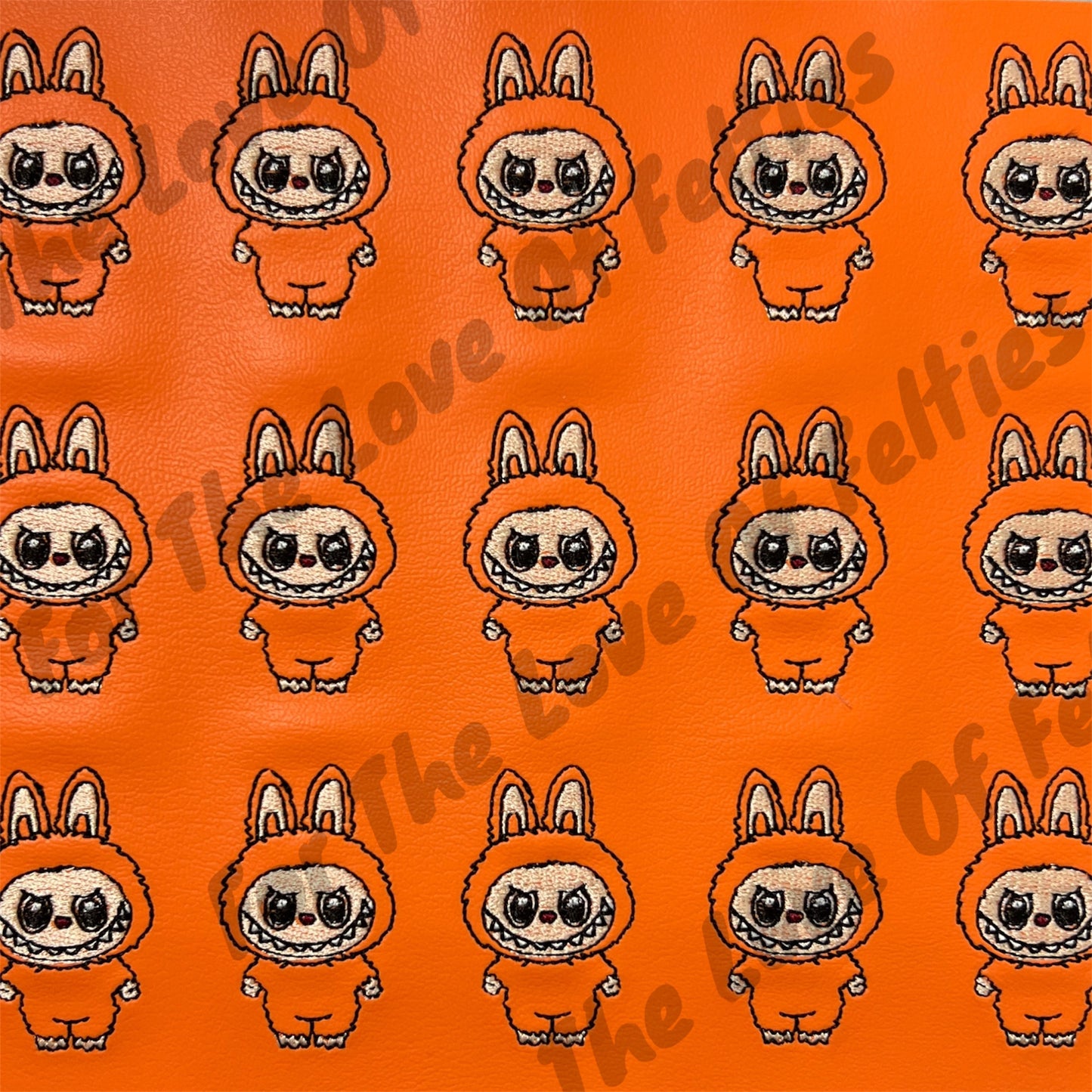 Orange Labubu Feltie