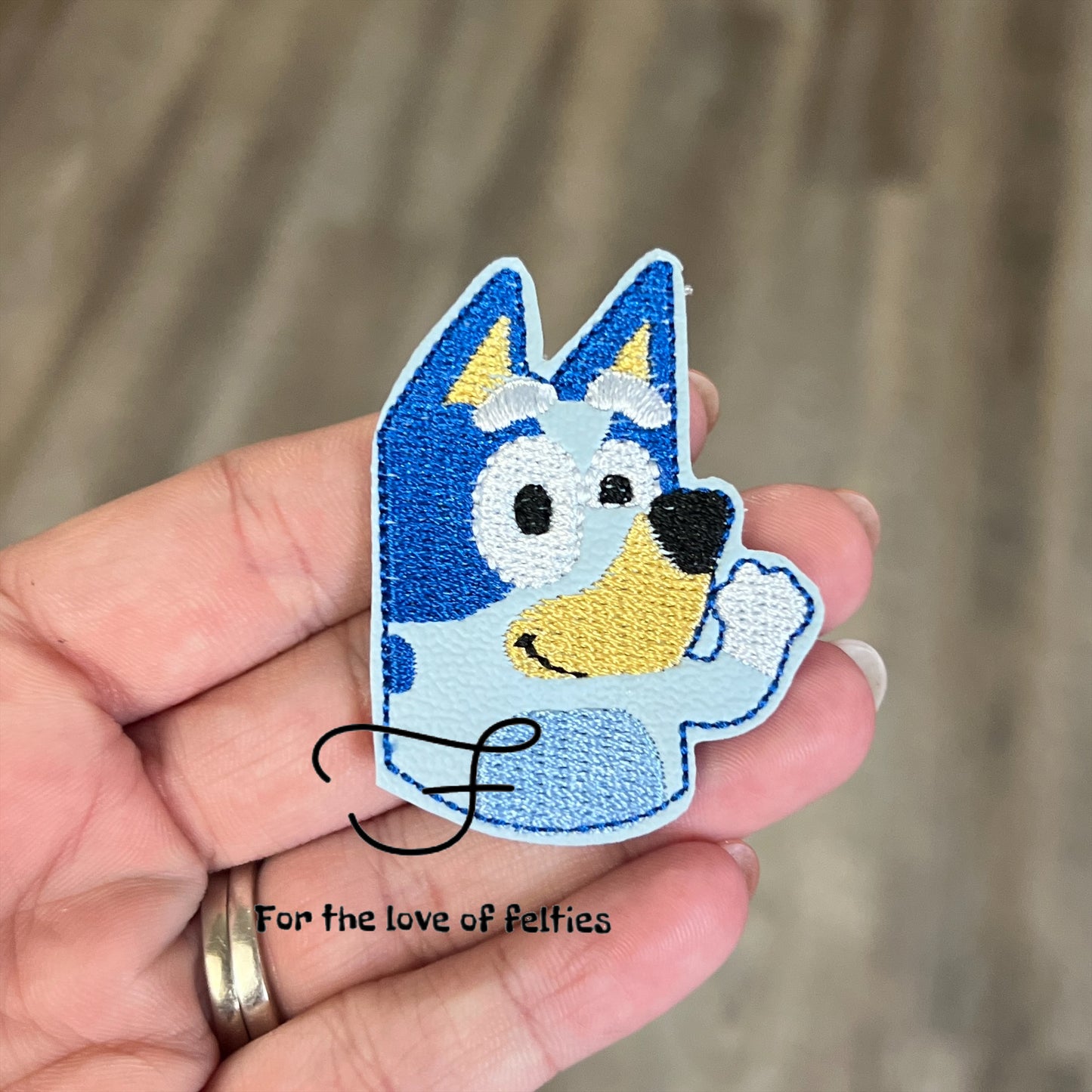 Waving Blue Dog Feltie