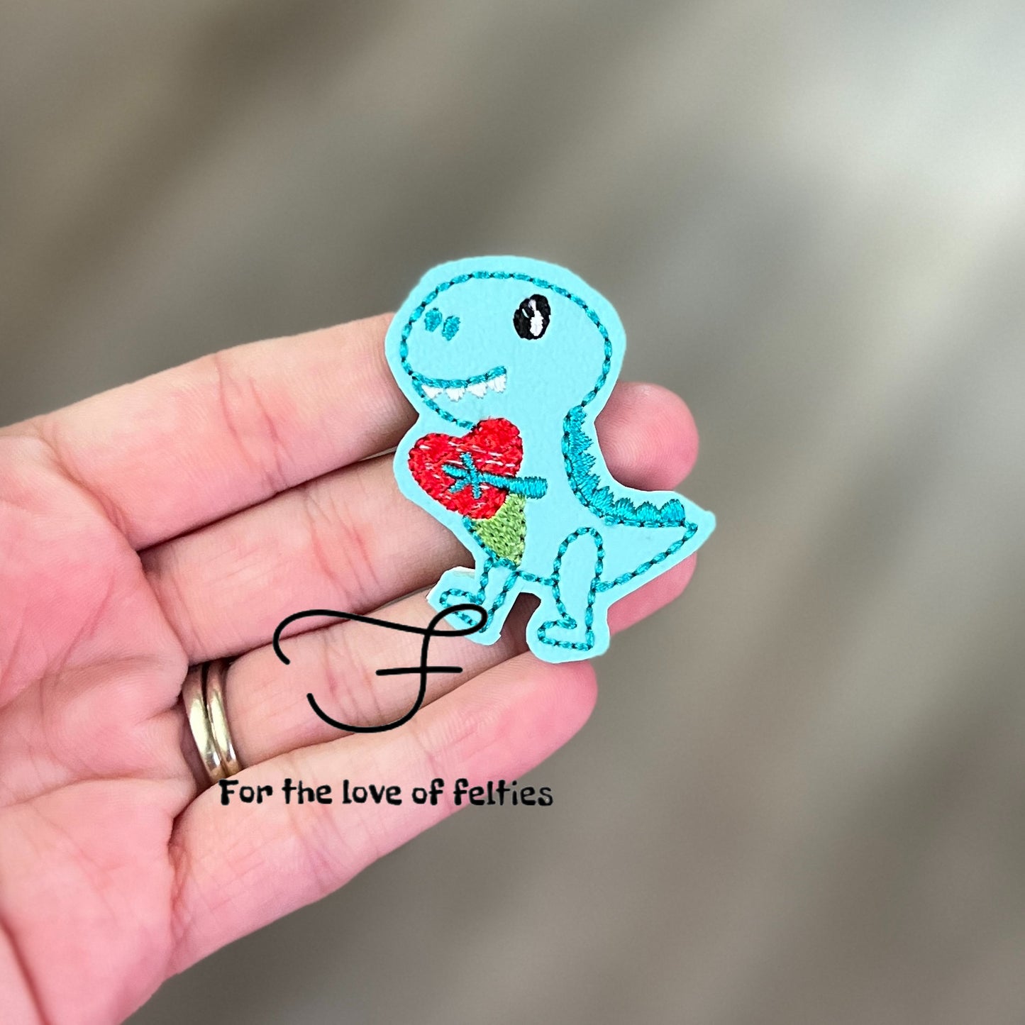 Dino Holding Heart Feltie