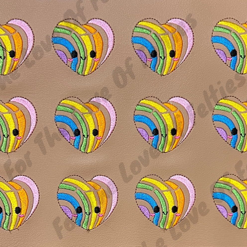 Conchita Rainbow Corazon Feltie
