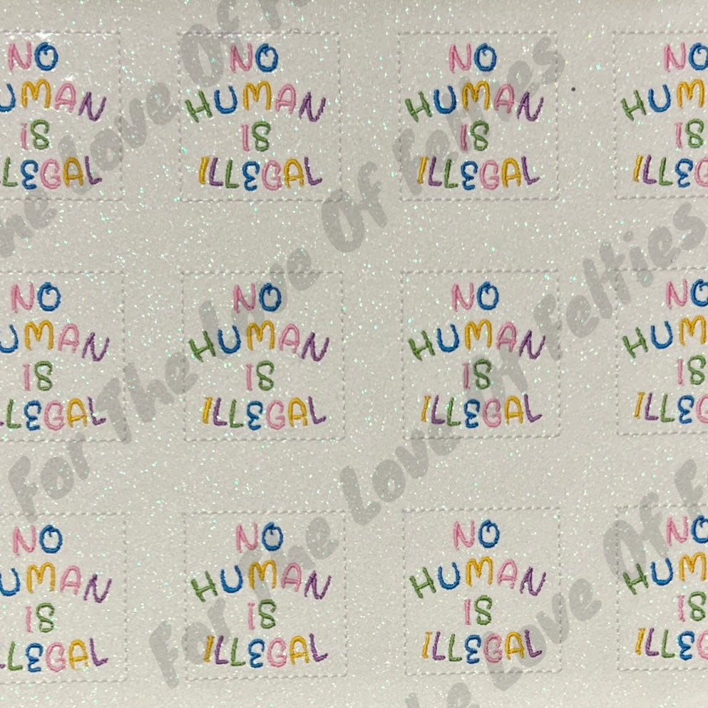 Exclusive No Human Is Illegal Feltie