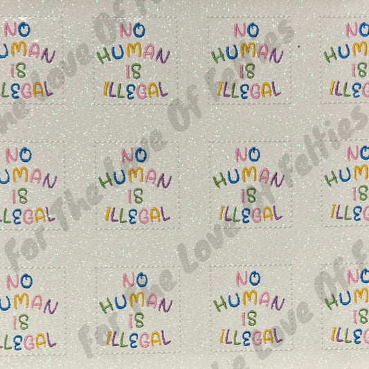 Exclusive No Human Is Illegal Feltie